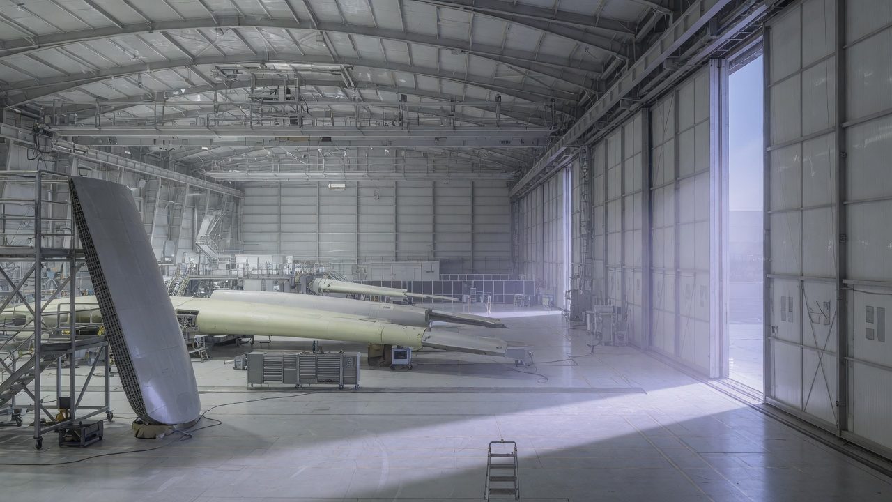 Aerospace hangar at dawn